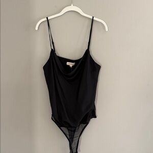 Trendy Boutique Sleek Black Bodysuit